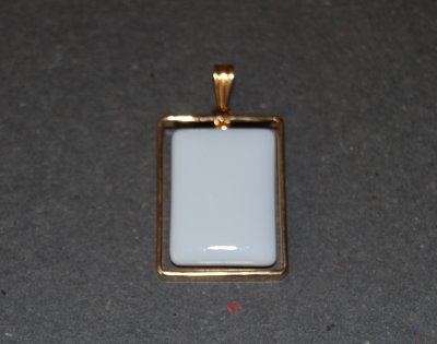 Medaljong Förgylld platta 23x16mm