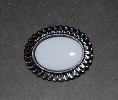 Brosch antik platina platta 25x18mm